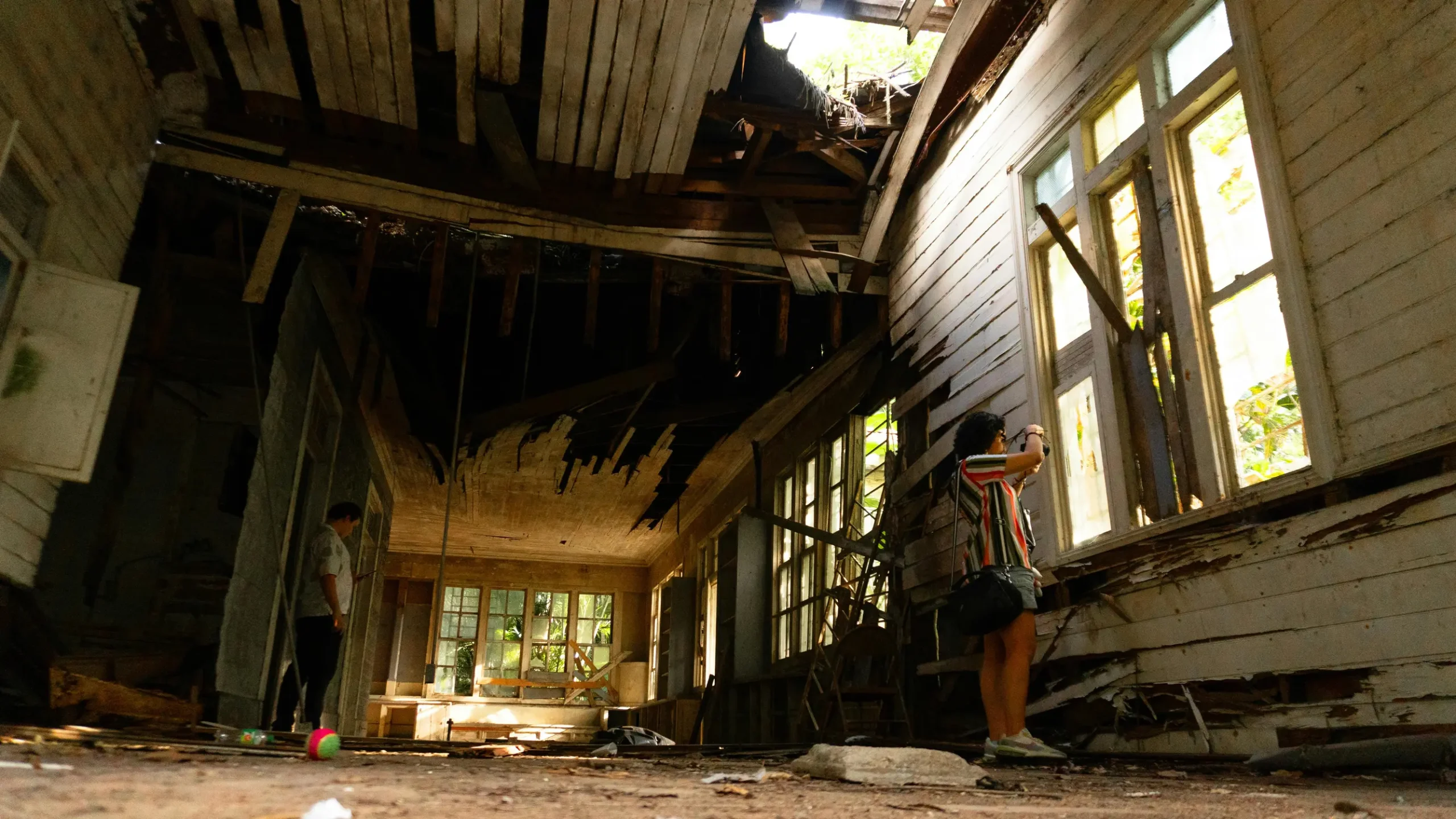 Photographer captures an abandoned house interior, showcasing decay and exploration.